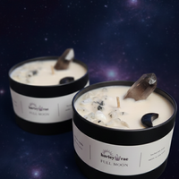 Two candles labeled 'Full Moon' by Harley Rae on a dark background with star-like elements.